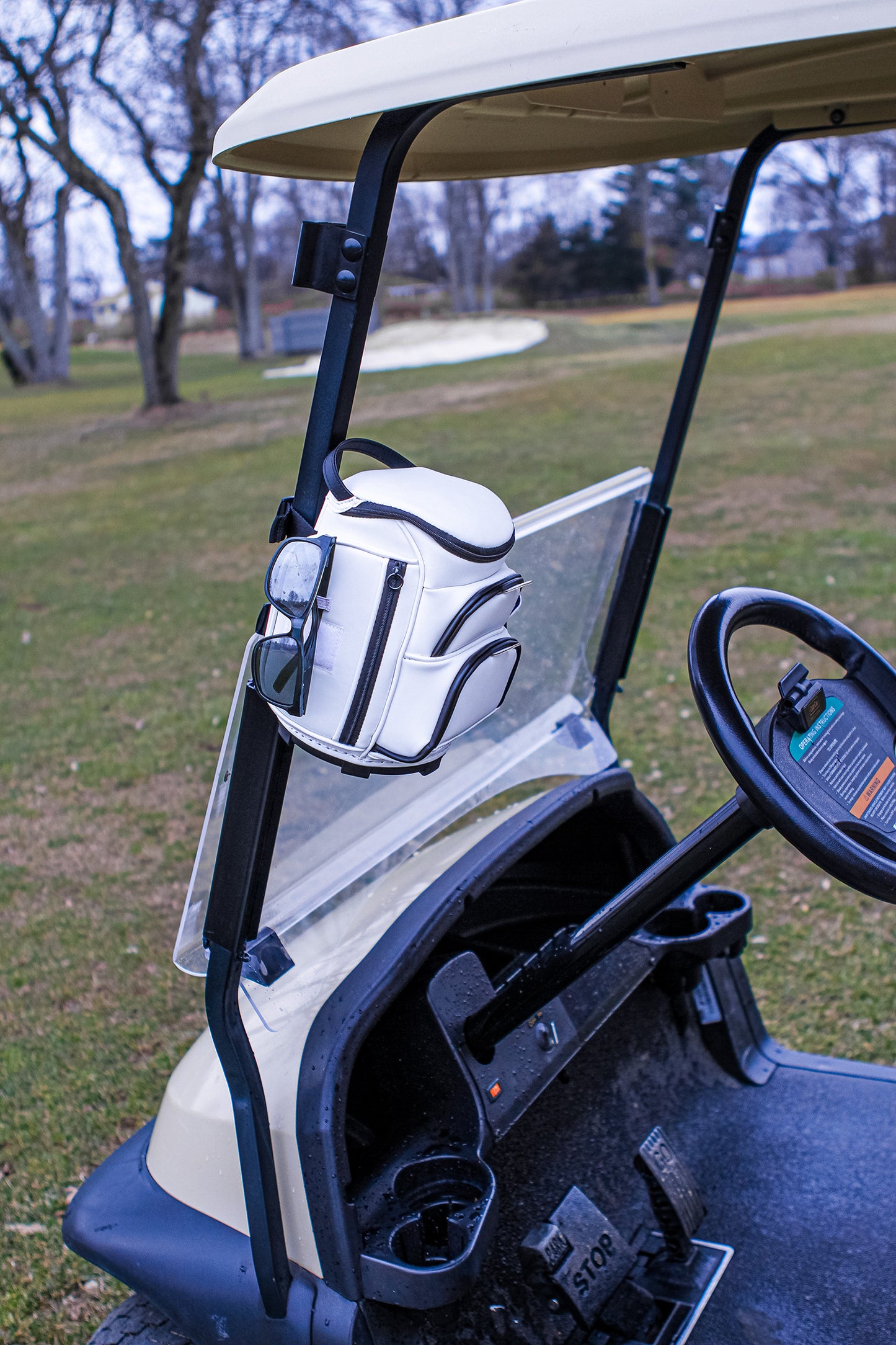 LIFT Golf Gear on cart with sunglasses